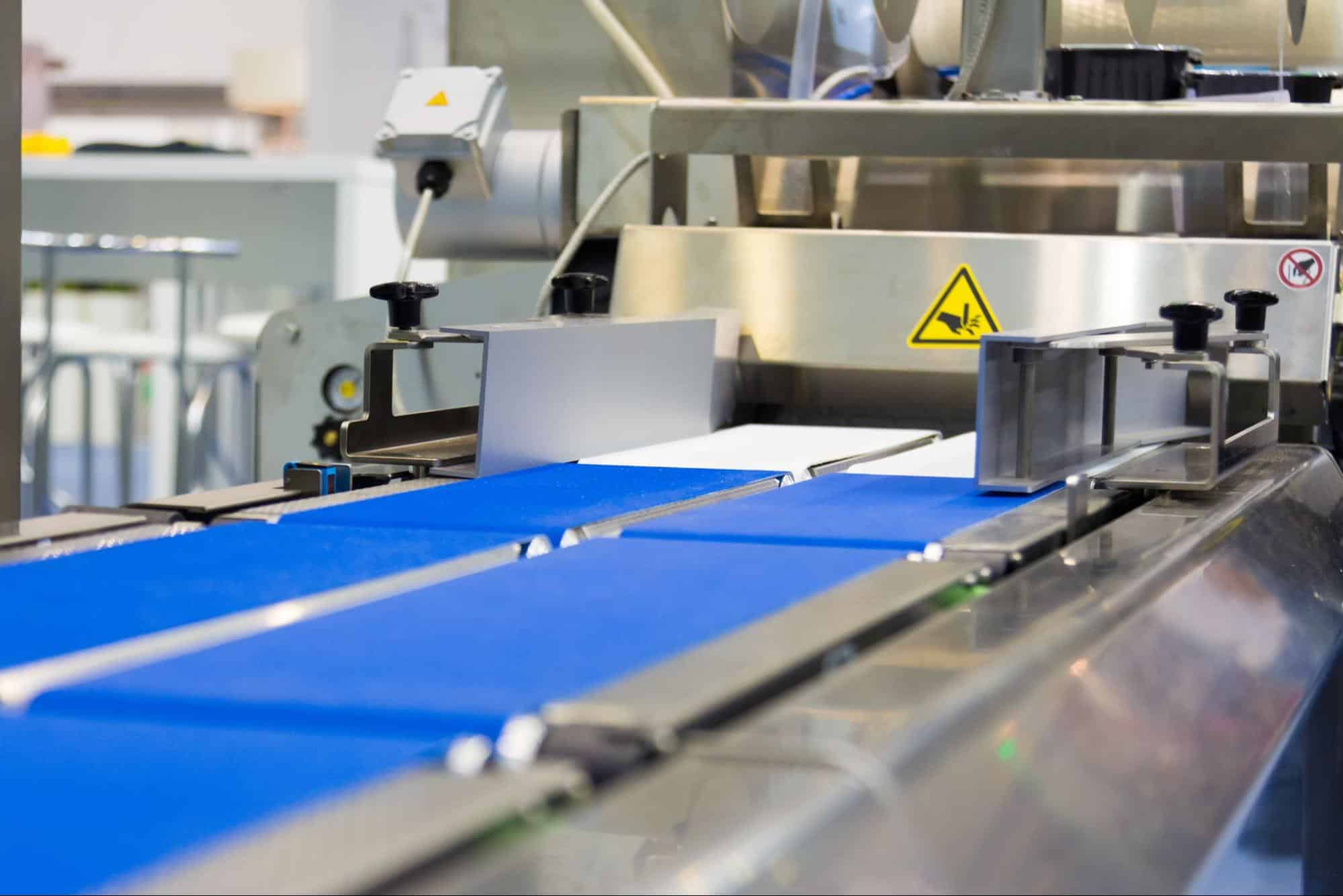 A blue modular conveyor belt is designed for safety and sanitary conveying. A lift gate can be added to a conveyor belt for safe, easy navigation without the need for catwalks or crossovers.
