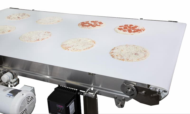 An AquaPruf conveyor from Dorner transports pizzas.