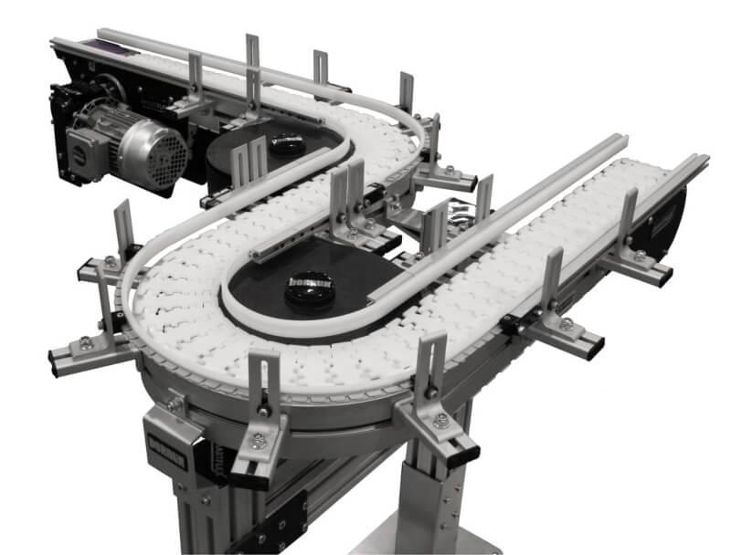 A FlexMove conveyor from Dorner, used for transporting medical devices and medical supplies.