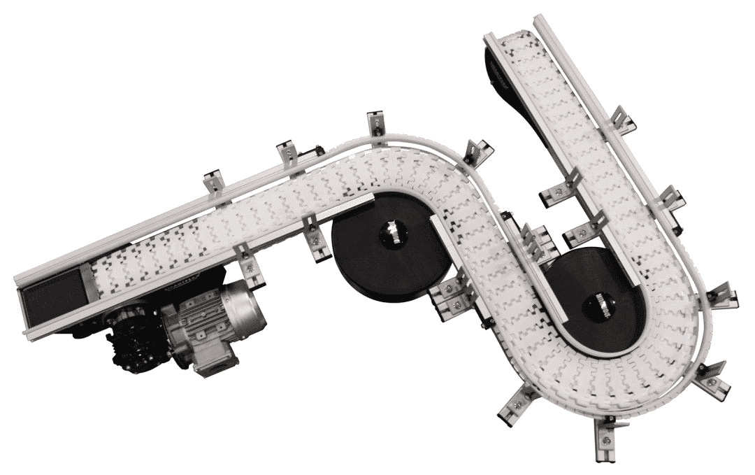A FlexMove industrial conveyor from above, capable of multiple curves as well as inclines and declines.